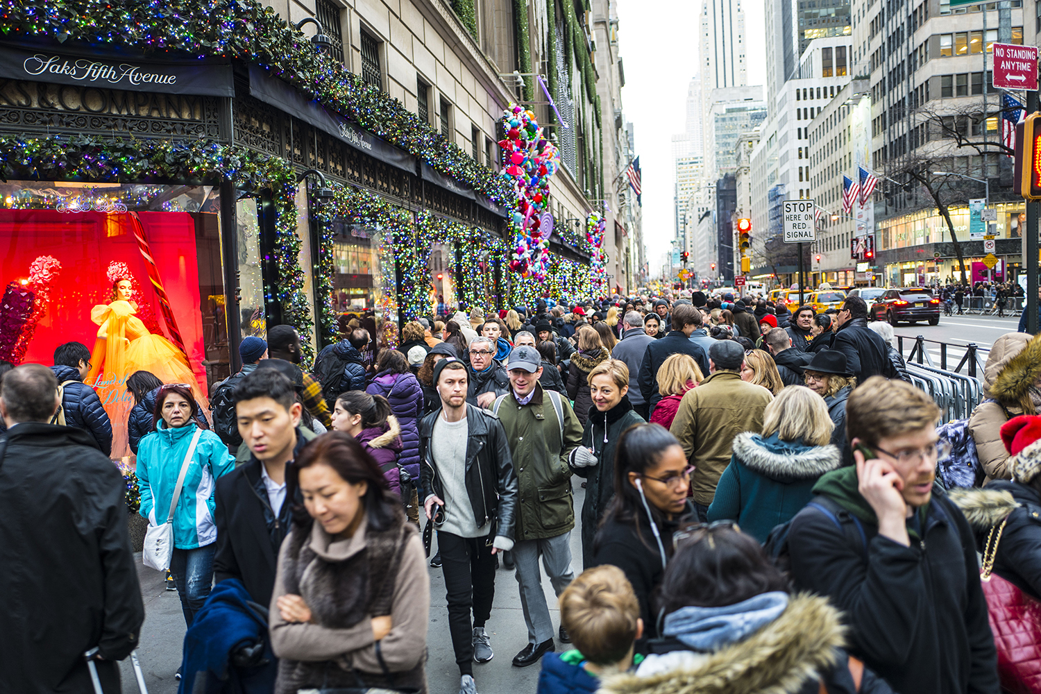 Christmas shoppers filling the sidewalks of Fifth Avenue with just two days of Christmas shopping before the holiday.