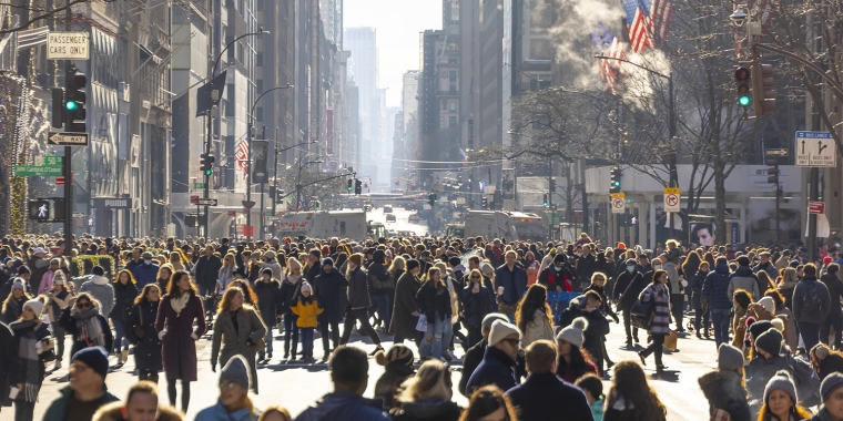 Crowd of People visit the Holiday Season Open Street on Fifth Avenue on Sunday afternoon in 2022.